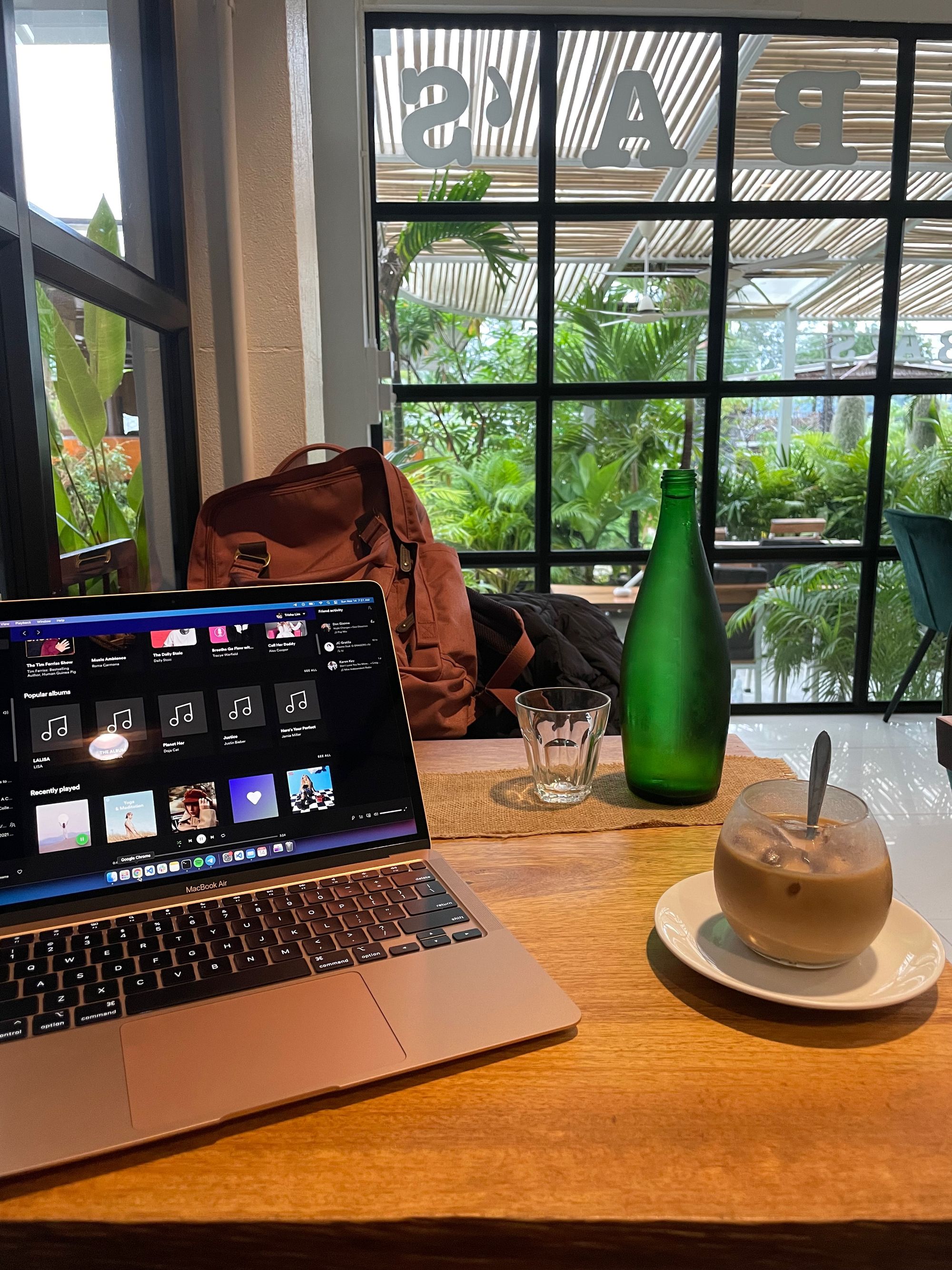 Laptop and coffee at a cafe
